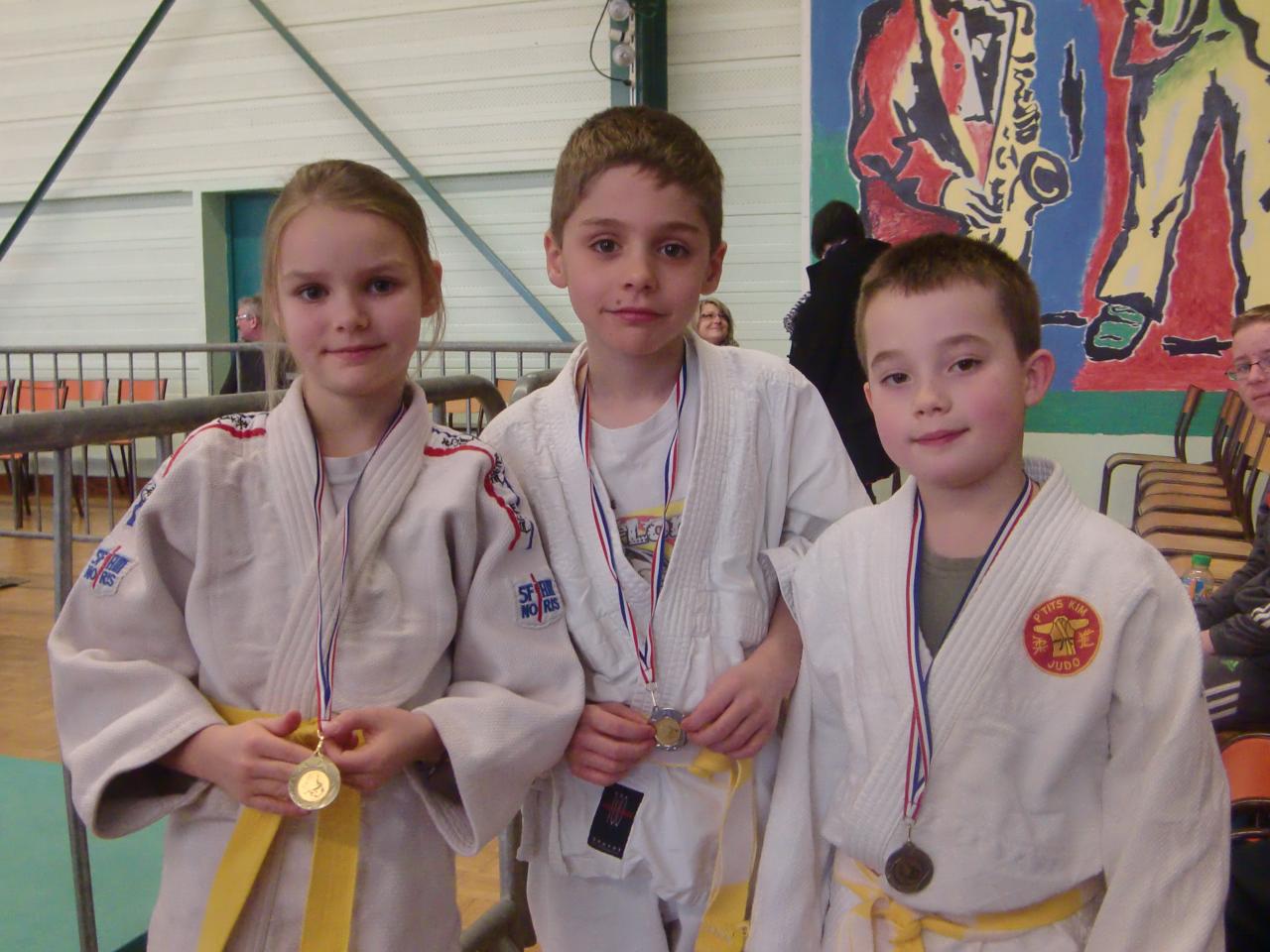 Poussins : Mael en Argent, Justine et Kylian en Bronze